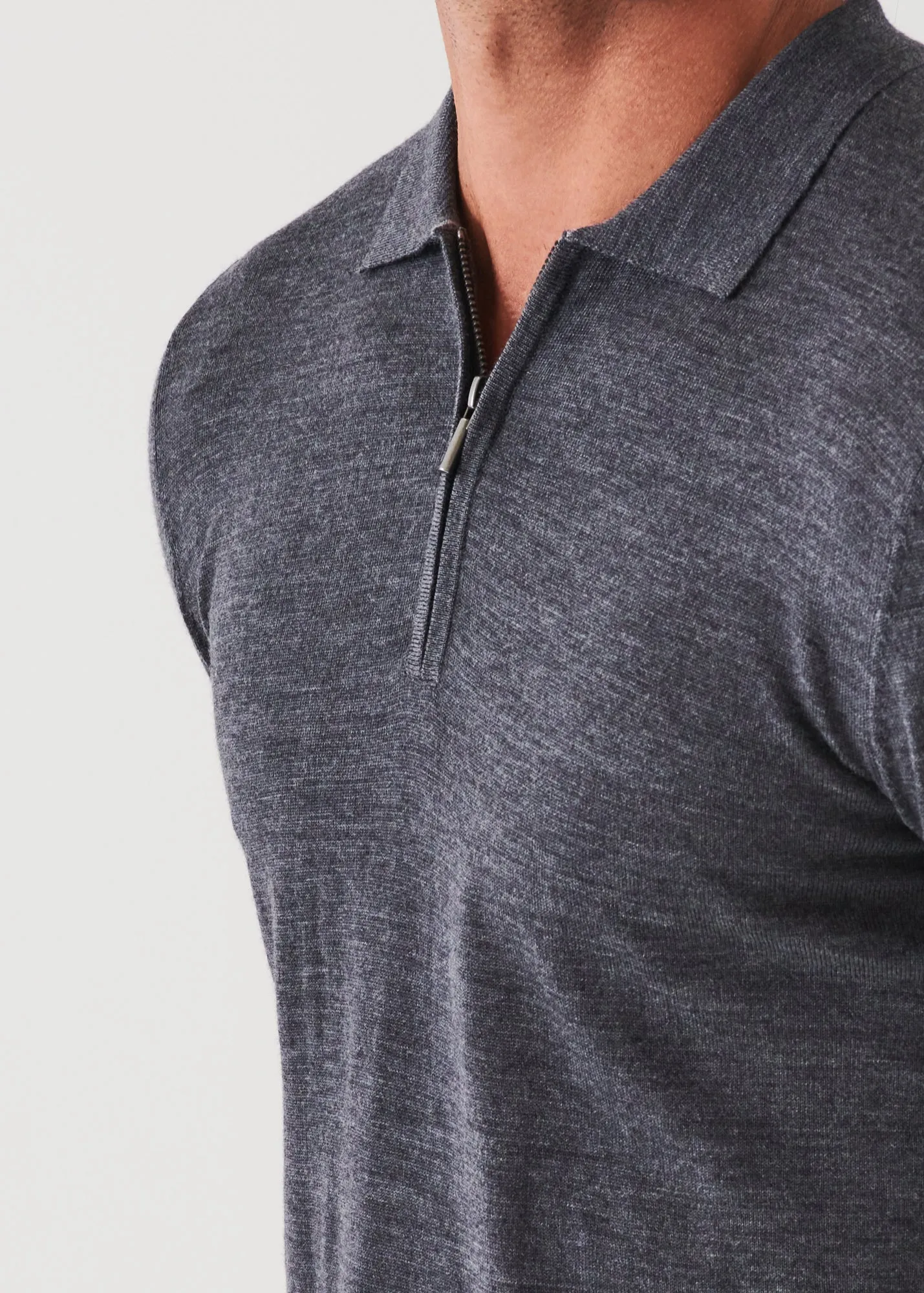 EXTRA-FINE MERINO QUARTER ZIP POLO