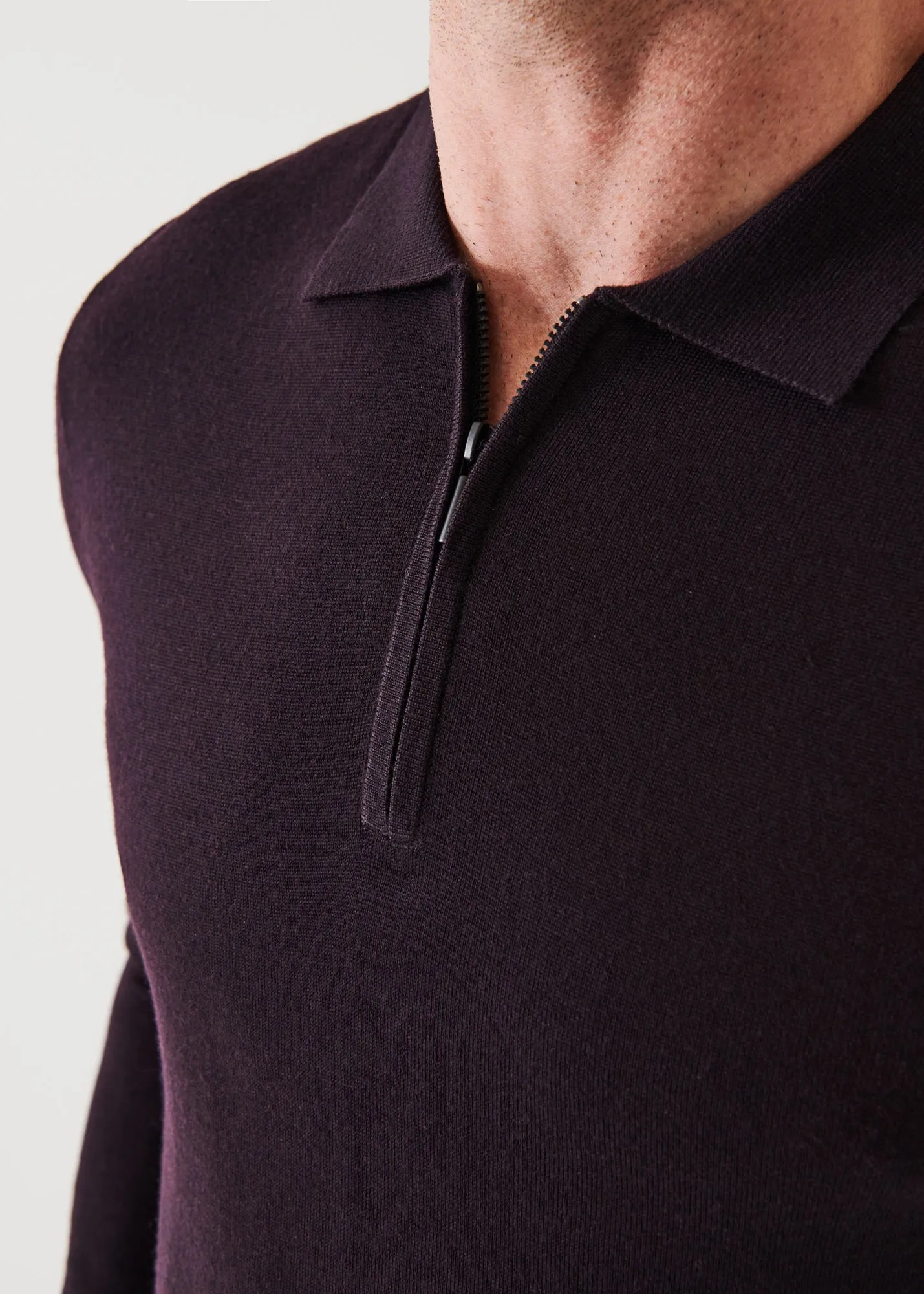 EXTRA-FINE MERINO QUARTER ZIP POLO